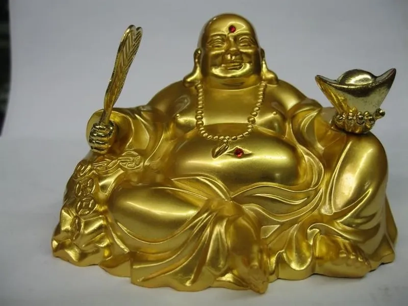 Góc làm việc sinh lộc với hình nền ông địa cho máy tính