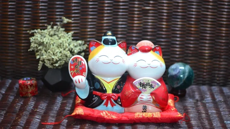 Mèo thần tài nổi bật trong hình nền chú mèo thần tài